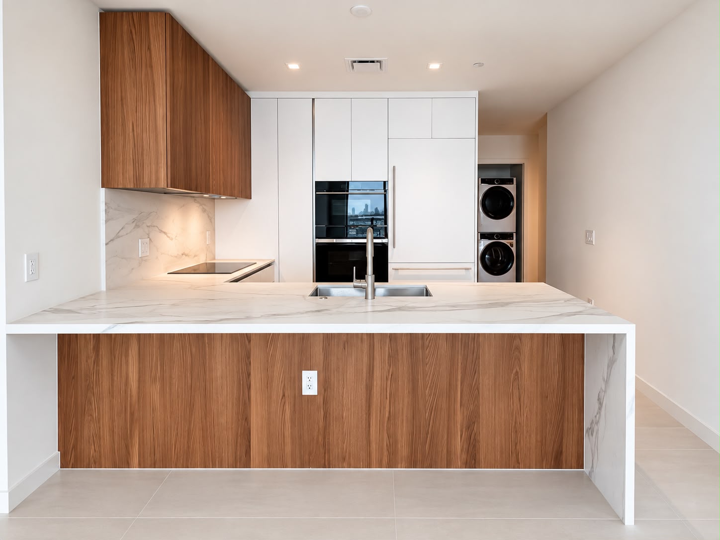 Italian kitchen island with integrated appliances and laundry