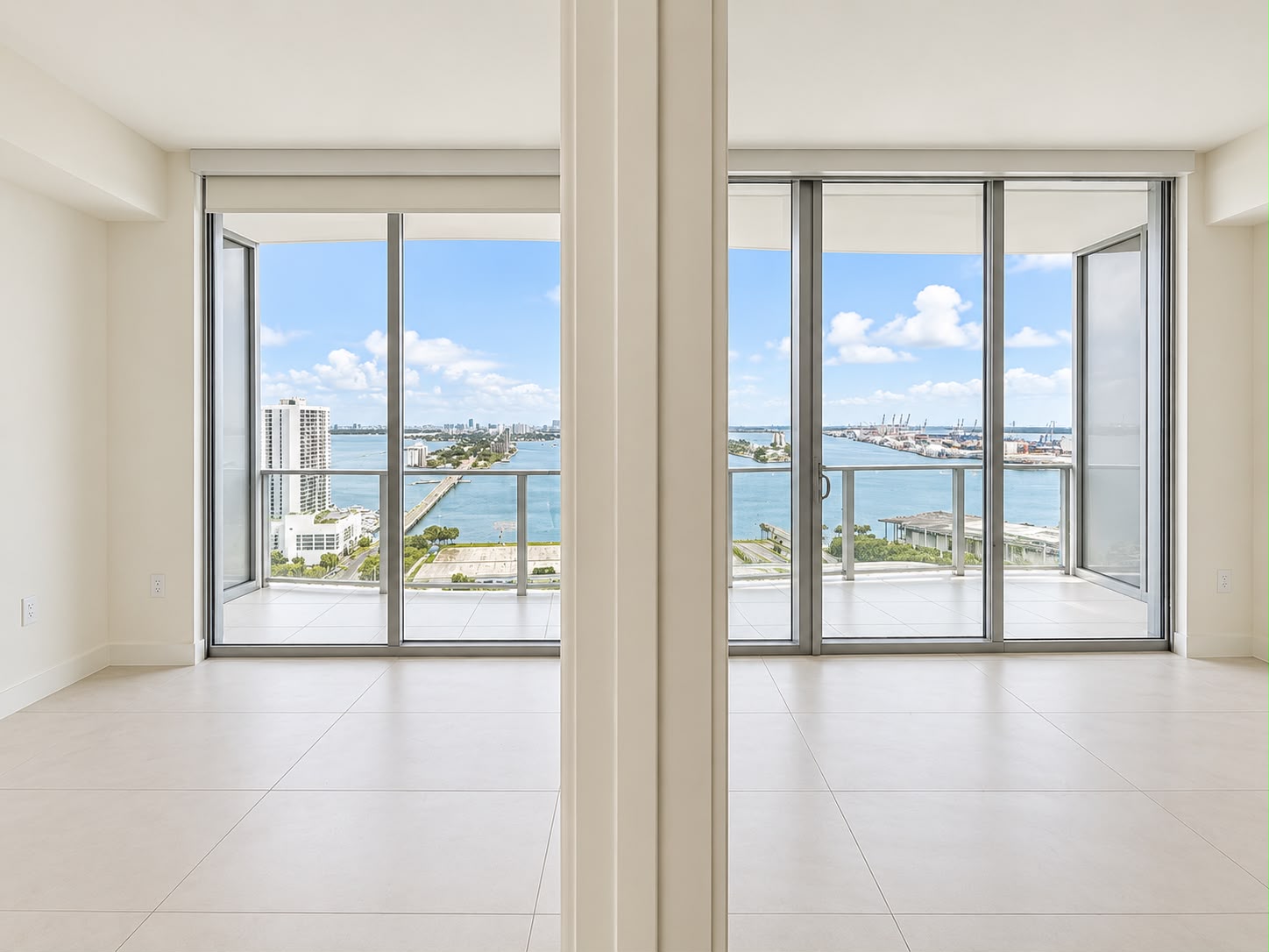 Corner glass walls of Residence 2504 with Biscayne Bay and downtown views