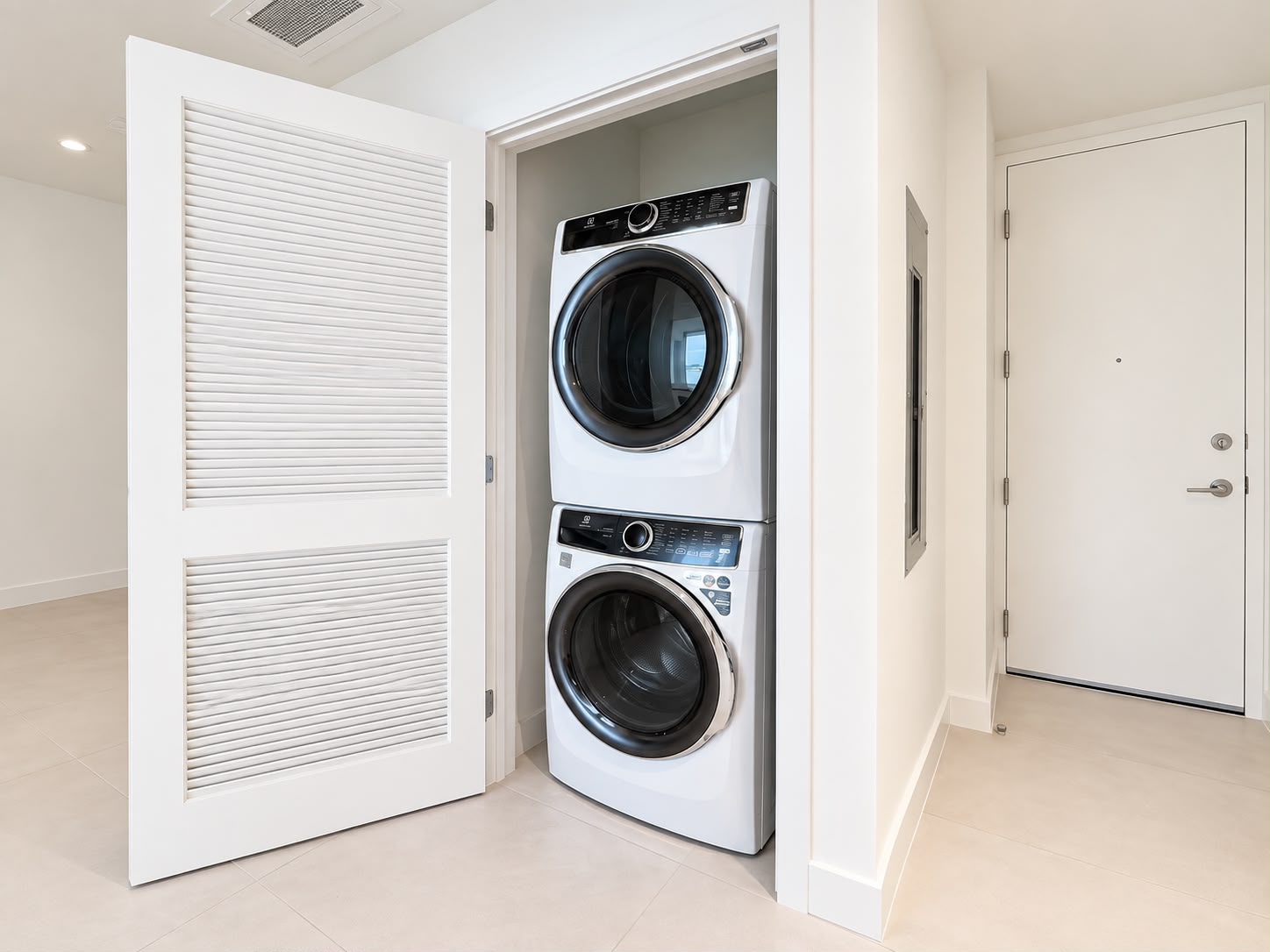 In-unit full-size washer and dryer closet