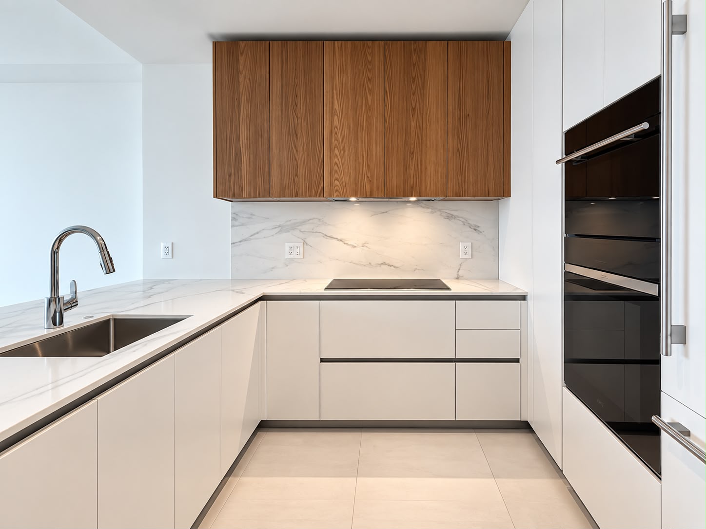 Integrated ovens and walnut cabinetry