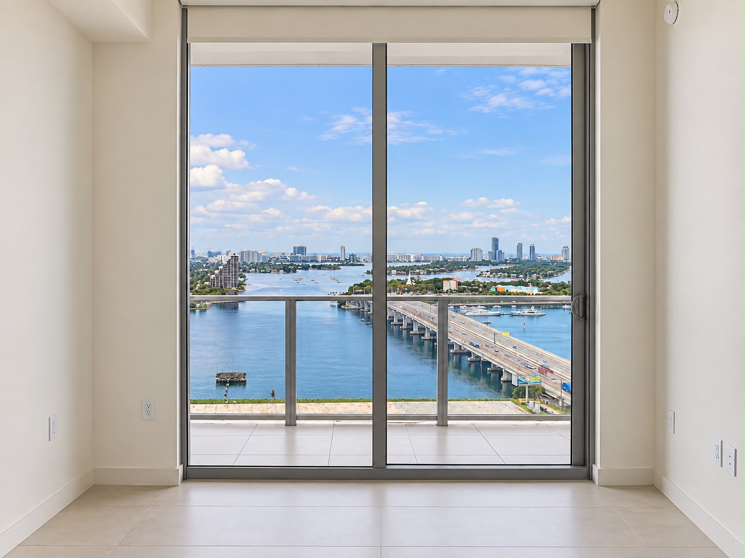 Floor-to-ceiling bay view from the living area of Residence 2504