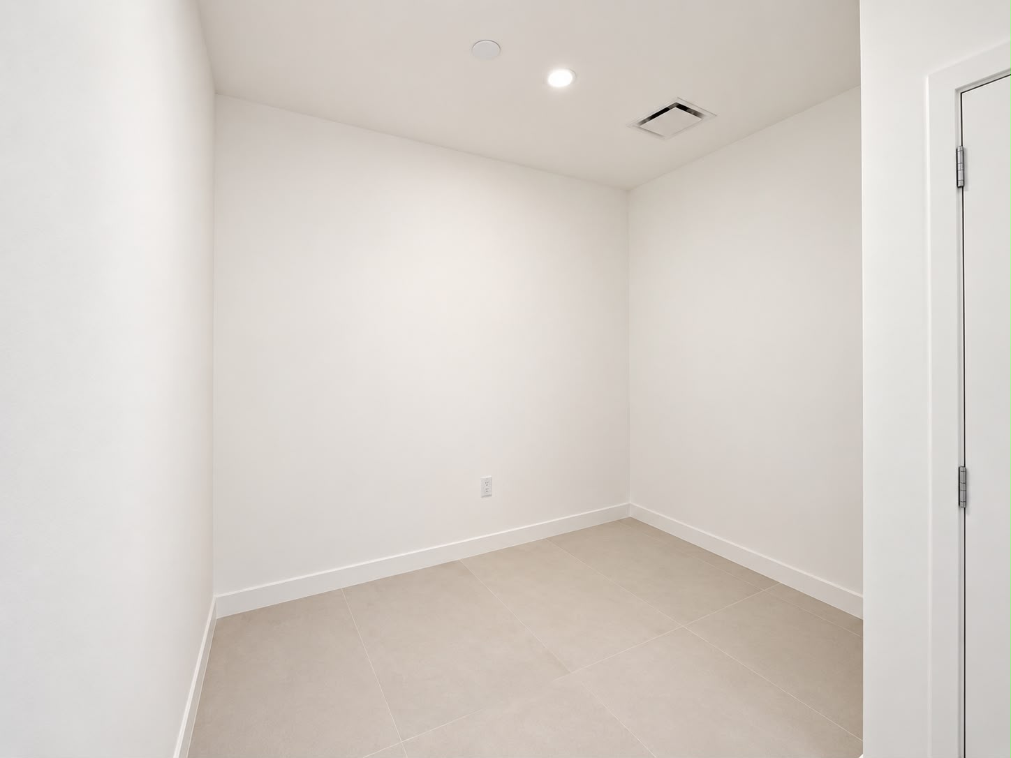 Enclosed den that works as a second bedroom